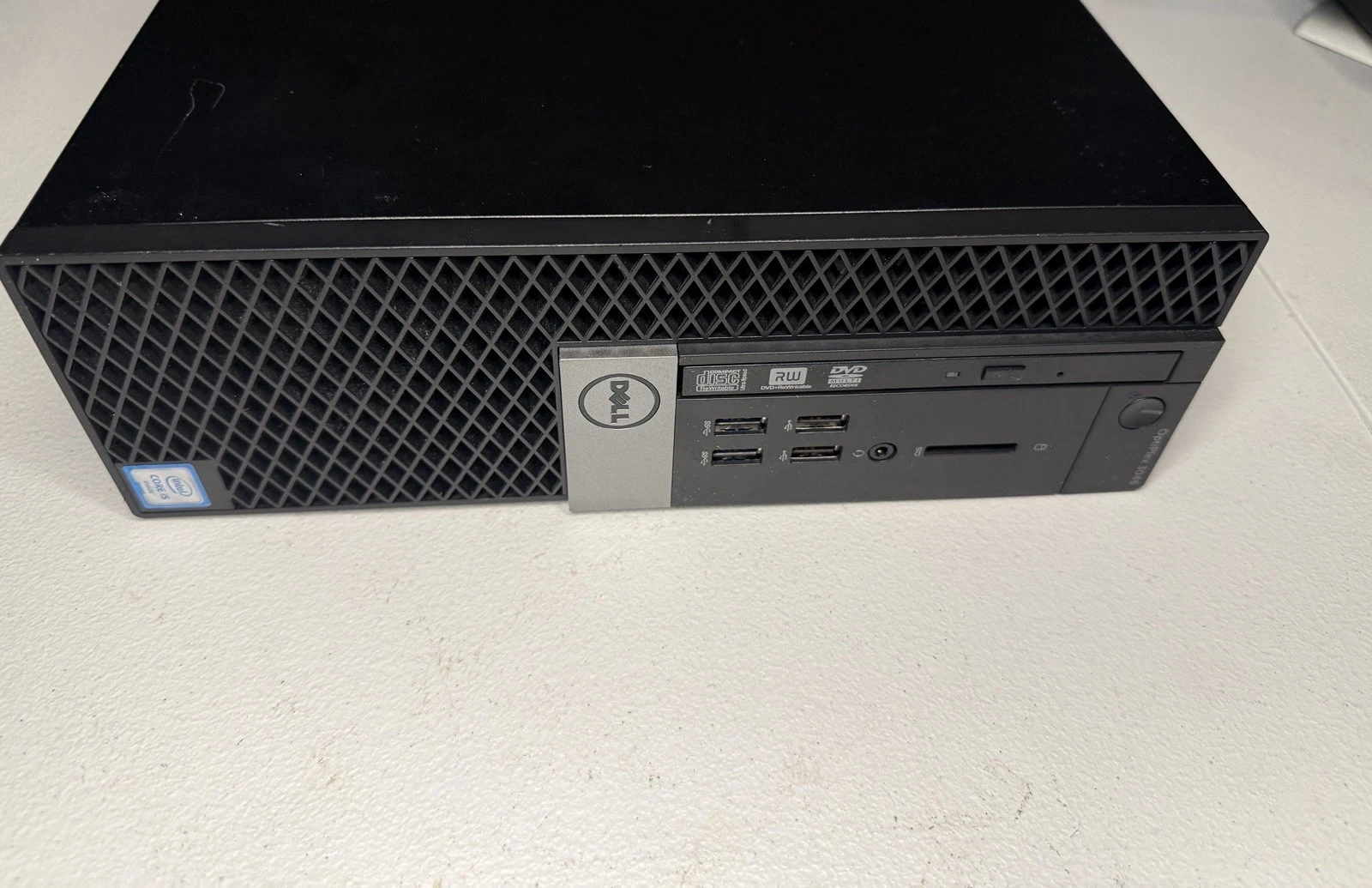 Front of the Dell OptiPlex 3046 with an Intel Core i5 sticker on the vented side of the case
