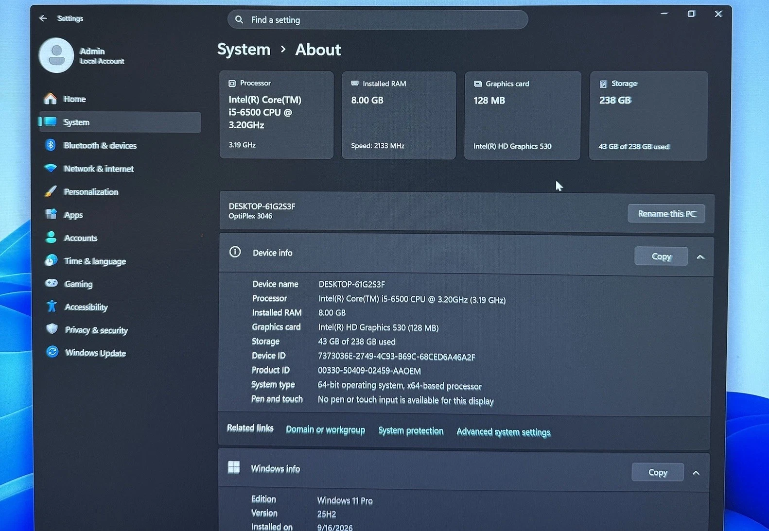 Windows 11 Settings About screen showing Windows 11 Pro on the Dell OptiPlex 3046